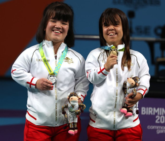 Powerlifters make history in triple medal haul